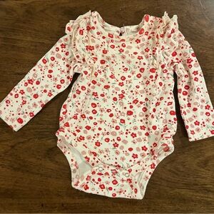 Pehr floral ruffle one piece. Great condition 0-3 mths no majors flaws stains!